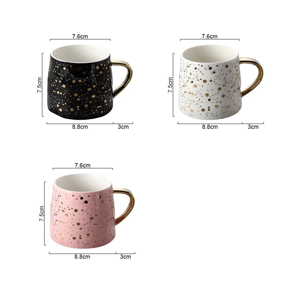 Goldgepunktete Kaffeetasse