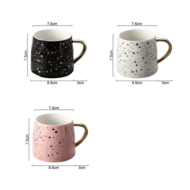Goldgepunktete Kaffeetasse